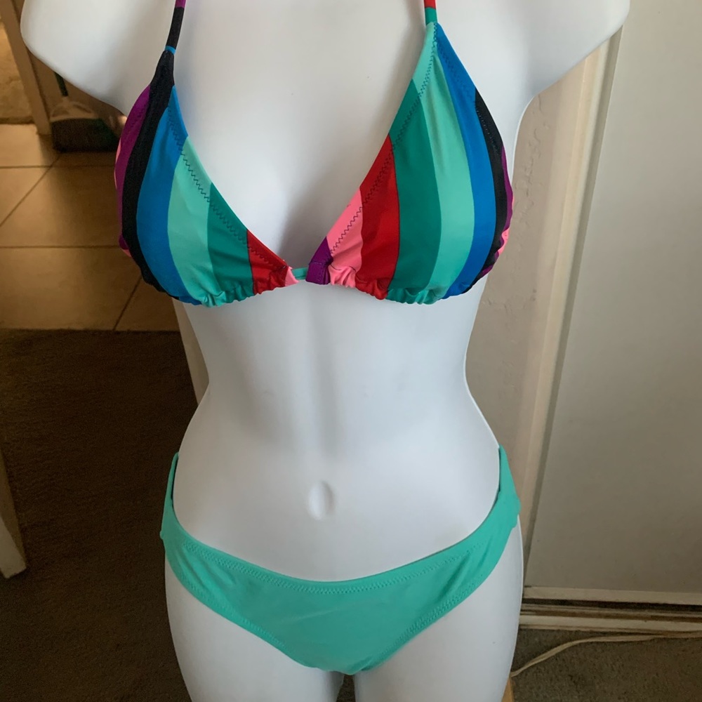 🎟️3x$10🎟️ 2 Multi colored tops and 1 bottom.